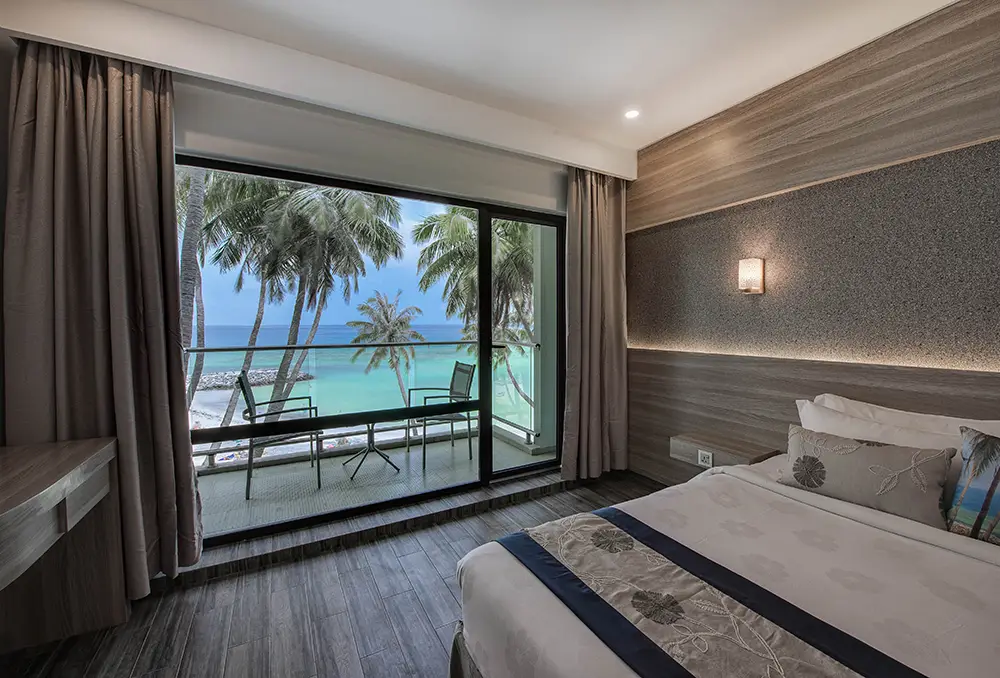 Maldives guesthouse for tropical holiday, offering cozy beachfront rooms, affordable stays, local experiences, pristine beaches, and unforgettable island adventures.