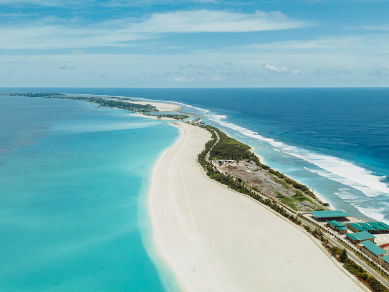 Addu Atoll coastline showing lagoon, reef edge and road connected islands in the southern Maldives