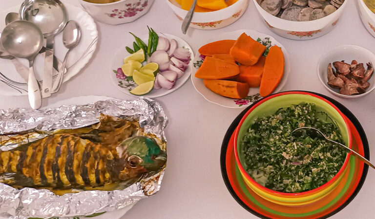 Everyday Maldivian island meal with grilled fish and coconut dishes in Addu